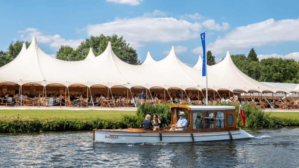 Henley IV drip therapy event with people enjoying outdoor dining.